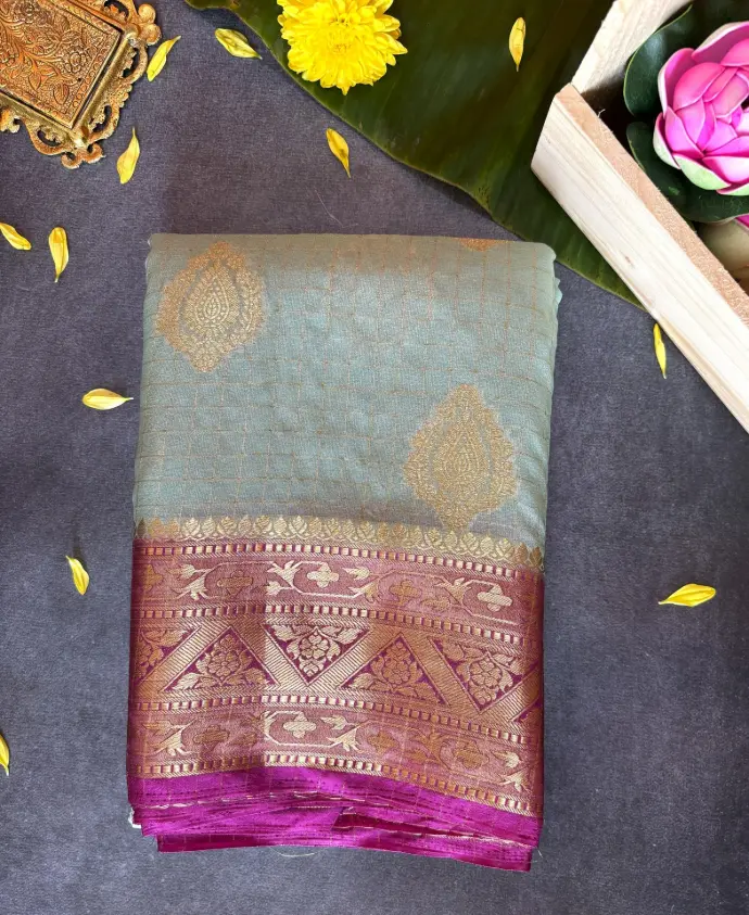 Mint green and magenta color georgette Saree with glod Zari work 