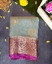 Mint green and magenta color georgette Saree with glod Zari work 