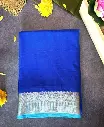 Royal blue Crepe silk saree featuring a sky blue and gold zari woven border