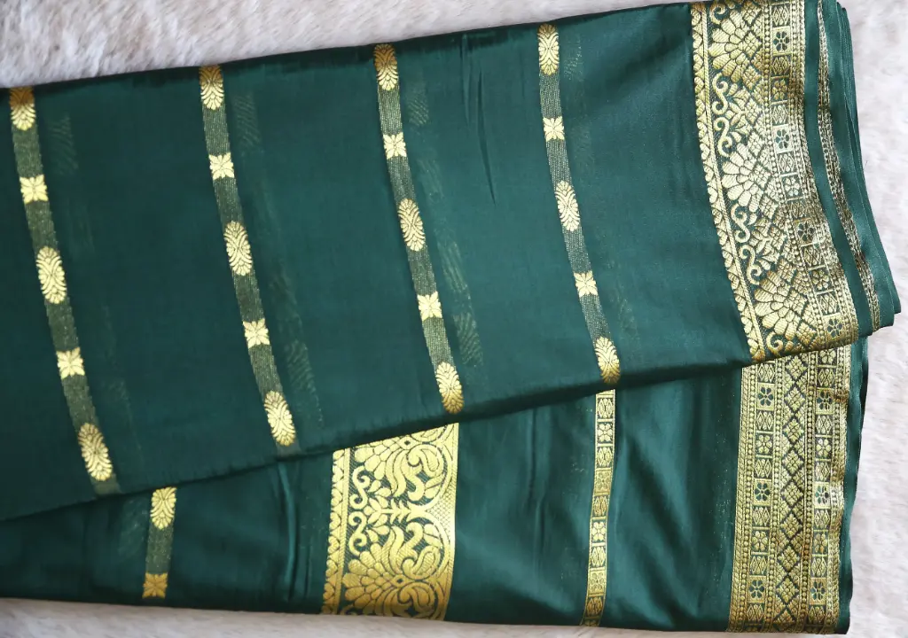 Green Crepe silk saree with Golden Zari work